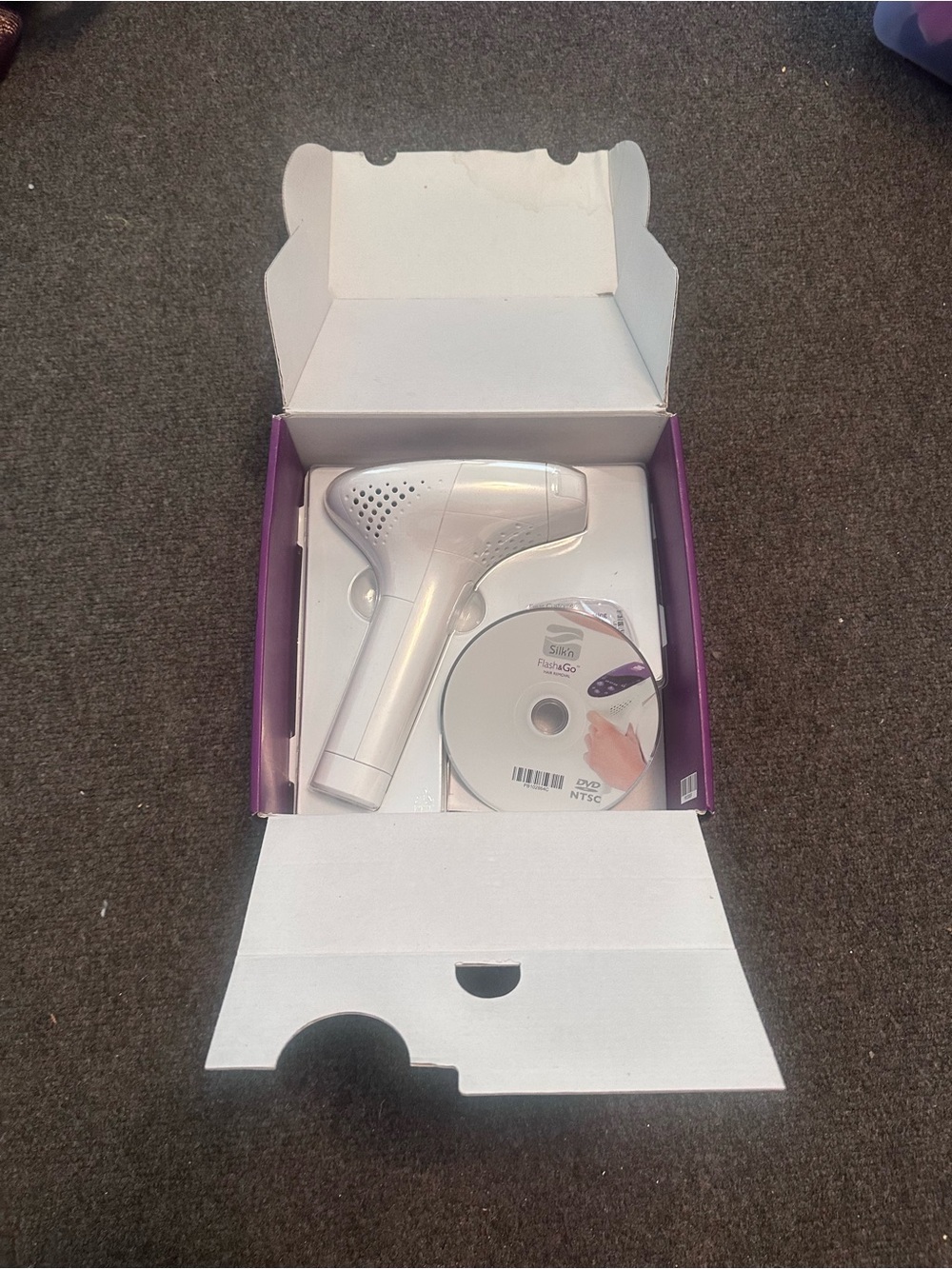 At-Home IPL Hair Removal Device in White with Instructional DVD